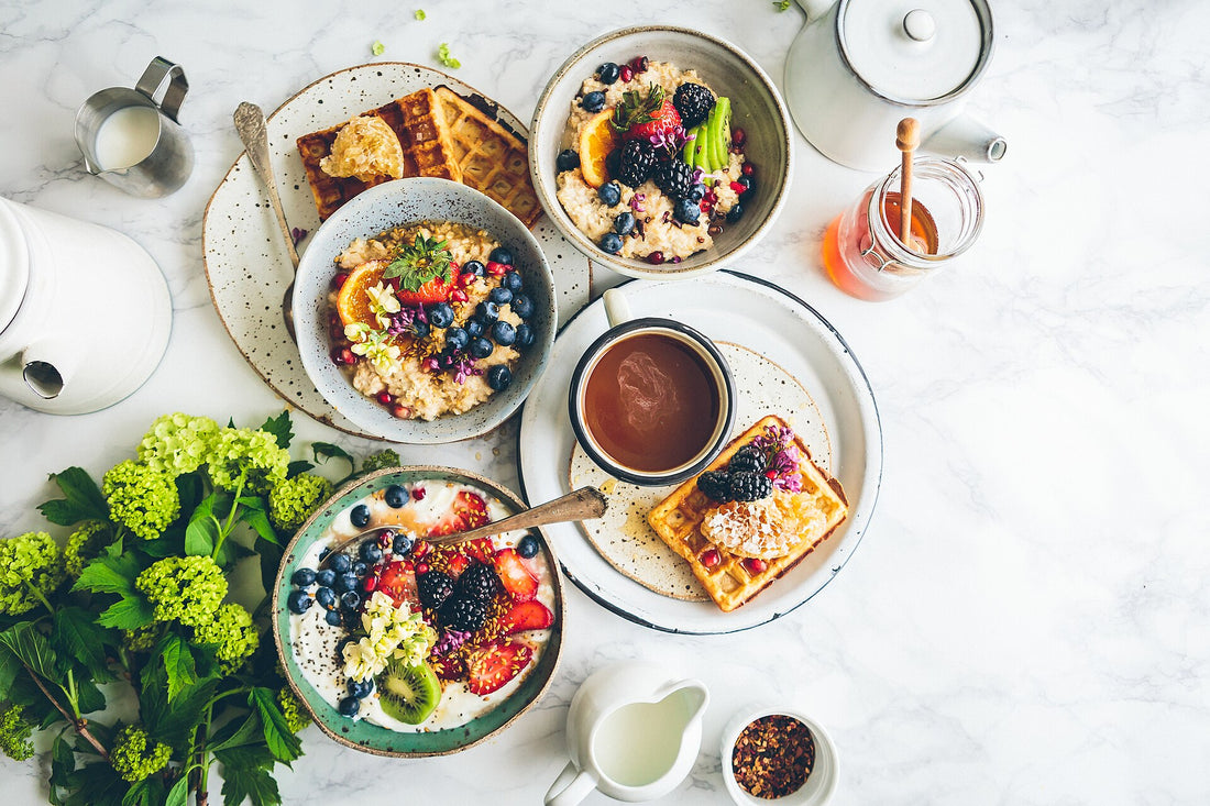Healthy breakfast with porridge, berries and fresh fruit